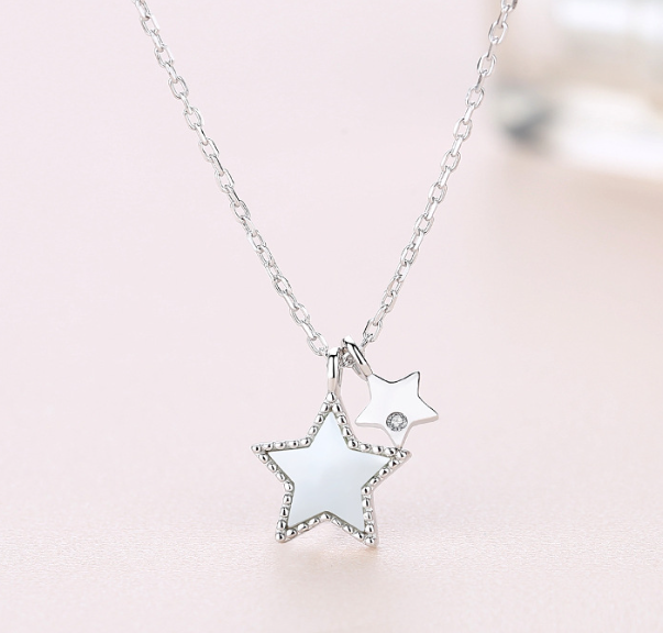 Twinkling star silver pendant
